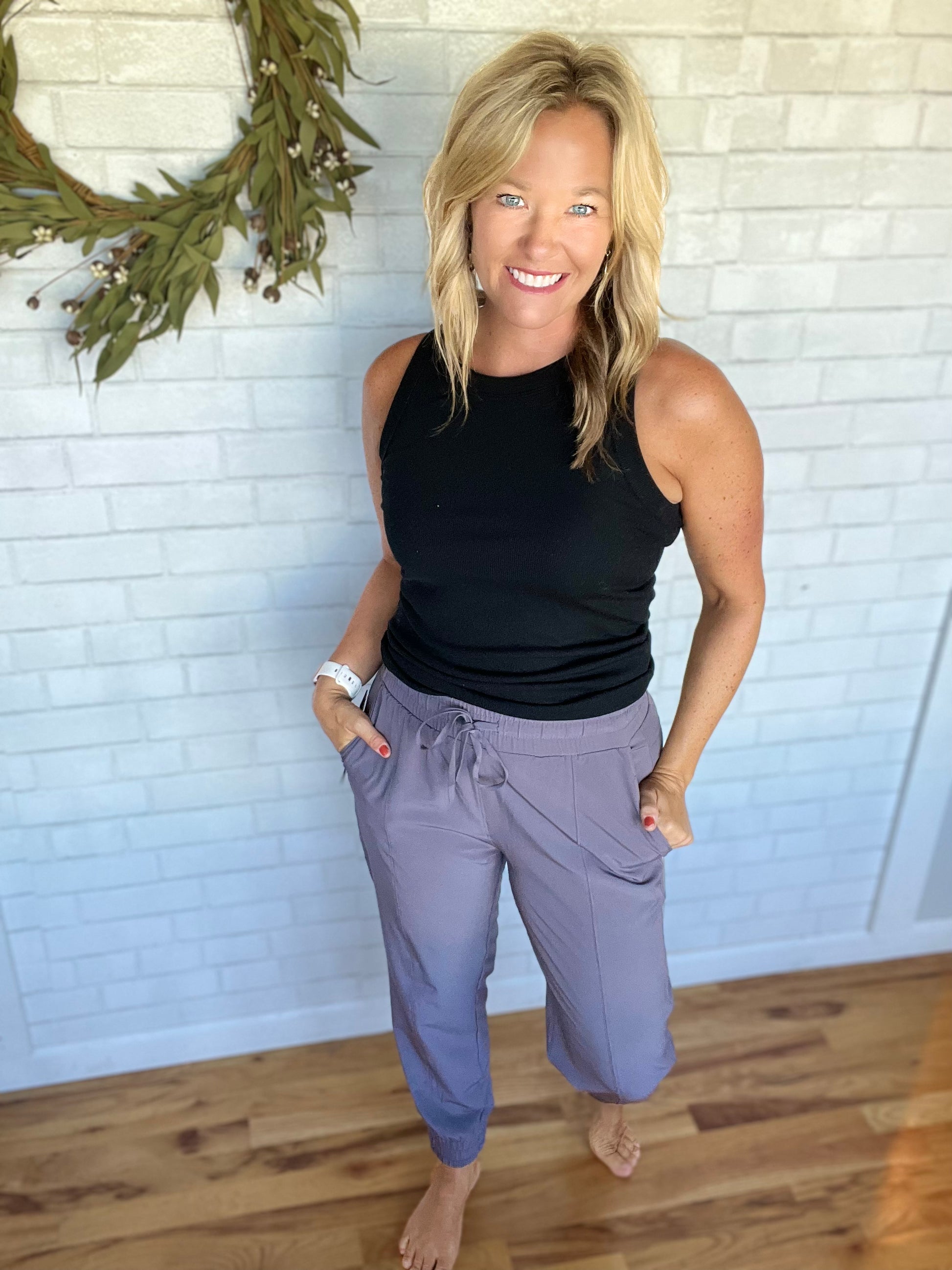Our favorite tank! A thinly ribbed tank that is more form fitting. A a little longer tank that is easy to tuck into any bottoms. Comes in lots of cute colors!