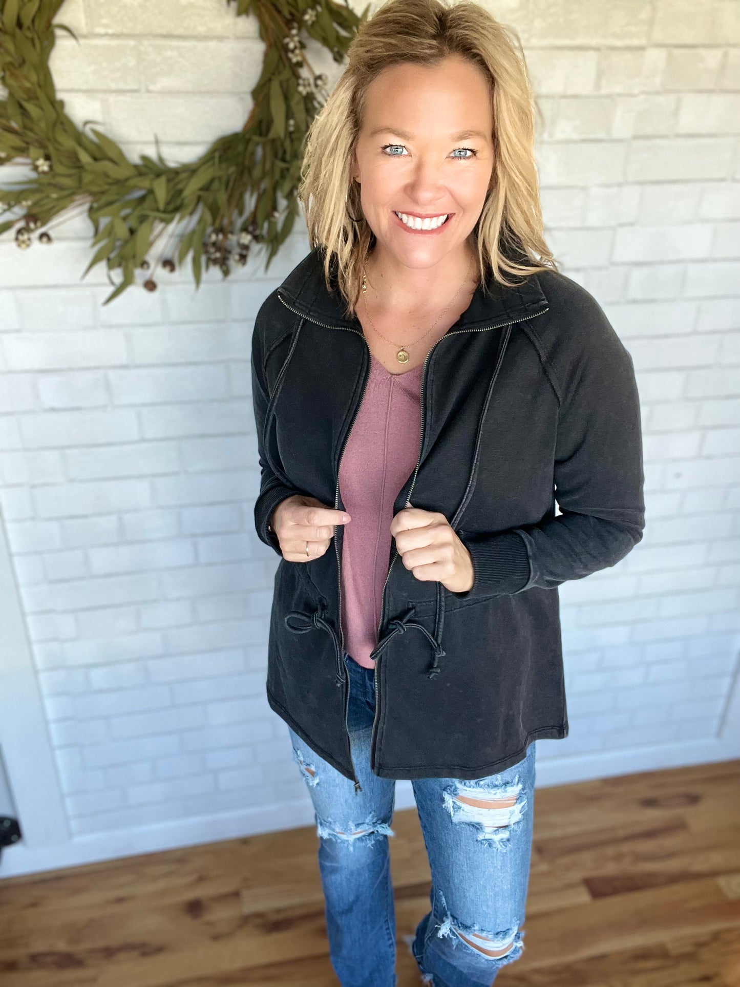 Such a cozy stretchy jacket. Aldo love the random spots scattered throughout! This one features a zipfront with a stand-up collar. Collar & waist feature a drawstring to help customize sizing. Features raglan sleeves and ribbing at cuffs. Fit is tue and wais is adjustable.