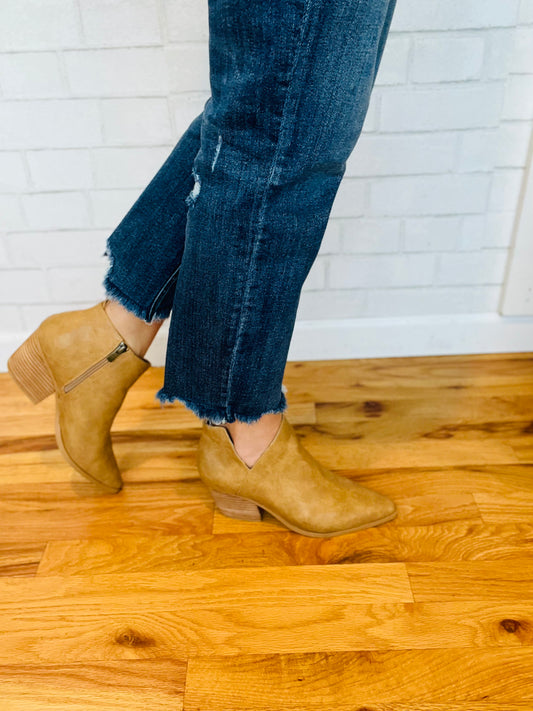A wear-everywhere casual bootie with a cut-out detail. These are the go-to classics missing in your closet.  2.25" Heel height 0.25" Platform height 3" Shaft height 10" Boot opening Faux leather upper Rubber outsole