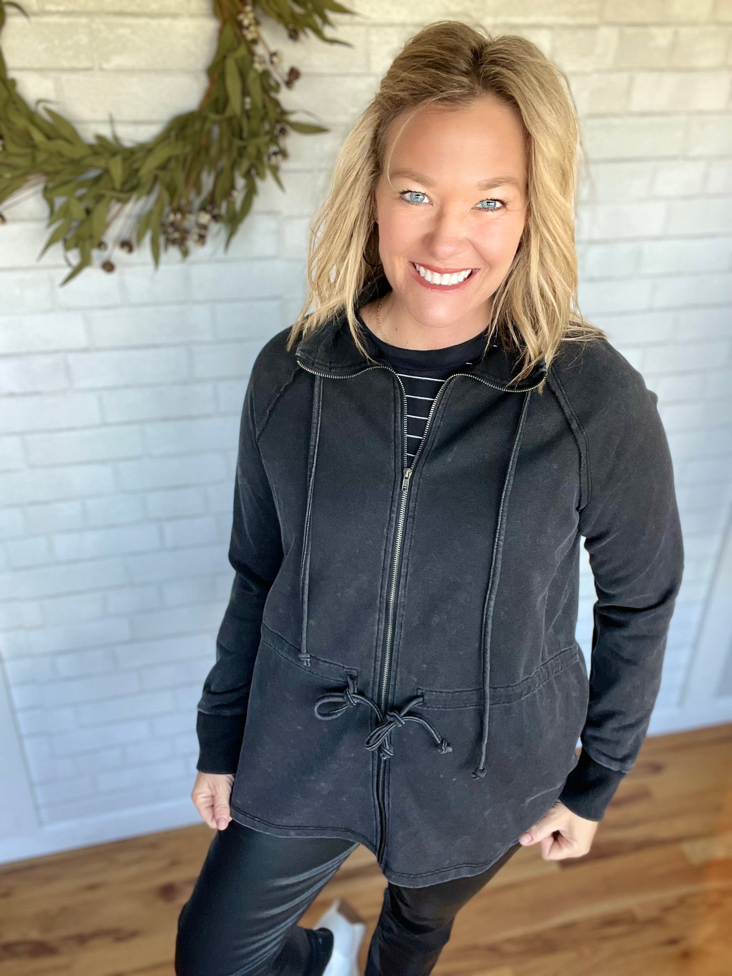 Such a cozy stretchy jacket. Aldo love the random spots scattered throughout! This one features a zipfront with a stand-up collar. Collar & waist feature a drawstring to help customize sizing. Features raglan sleeves and ribbing at cuffs. Fit is tue and wais is adjustable.